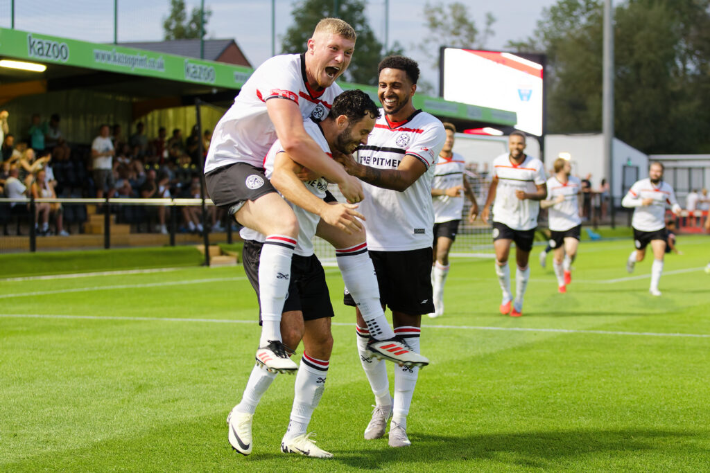 Players celebrating on field.