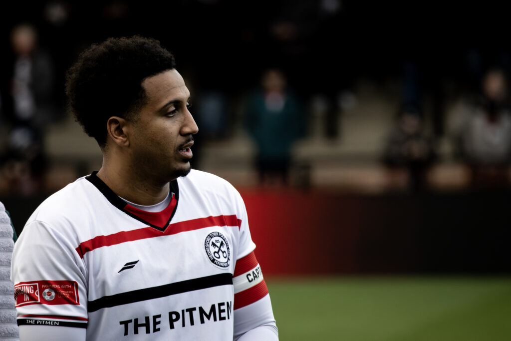 Dom McHale close up wearing a Pitmen shirt